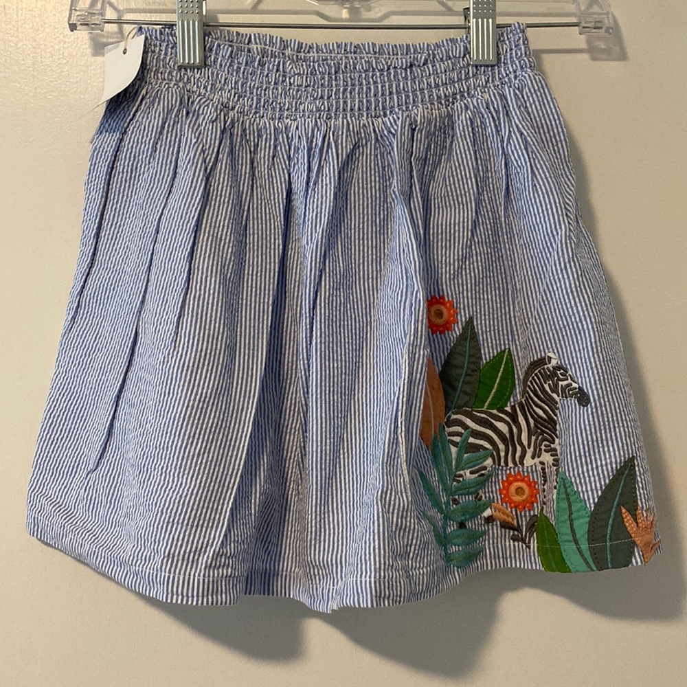 Mini Boden Blue and White striped skirt with zebra tropical appliqué.